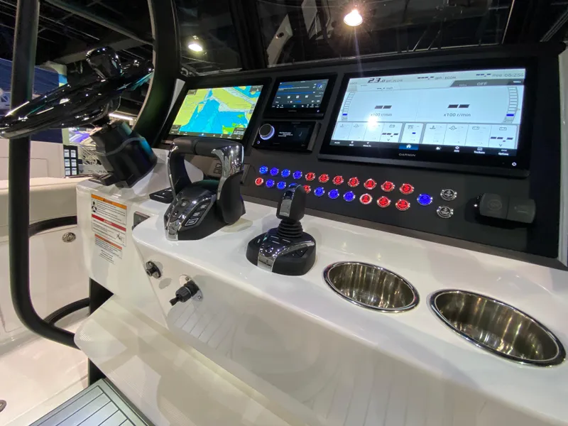 Slide: The Image of Edgewater 340CC 2025 boat dashboard with advanced navigation and control systems. - 15