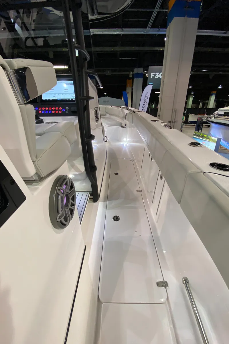 Slide: The Image of 2025 Edgewater 340CC boat interior, showcasing sleek design and advanced features. - 32