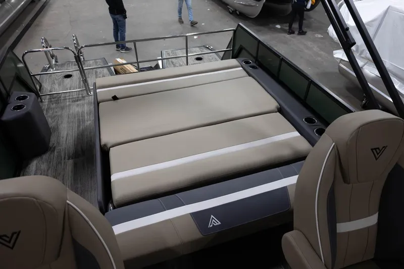 Slide: The Image of 2025 Viaggio X22S boat interior with beige seating and modern design. - 12