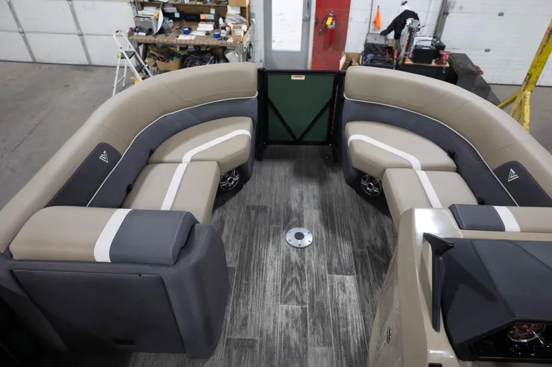Slide: The Image of 2025 Viaggio X22S boat interior with curved seating and modern design. - 2