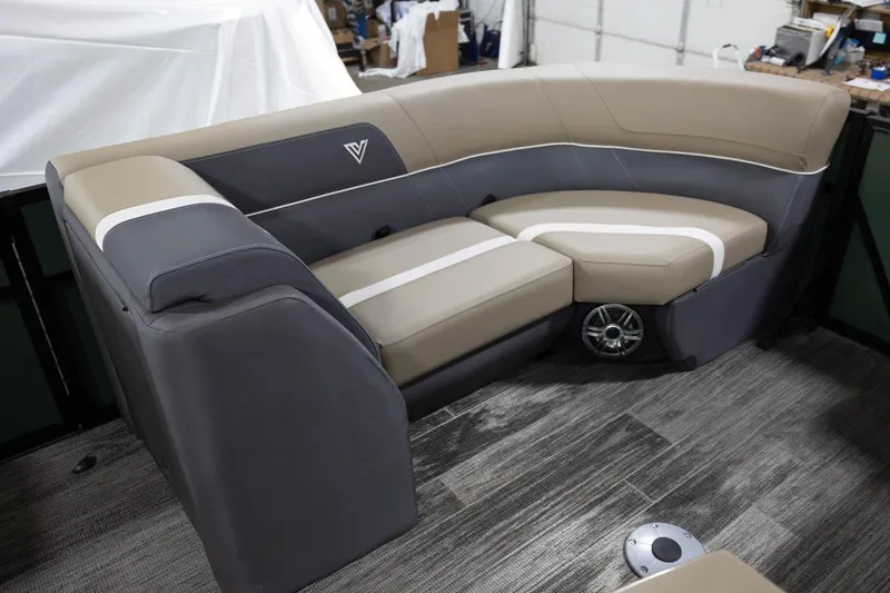 Slide: The Image of Viaggio X22S 2025 boat interior with beige and gray seating, modern design. - 3