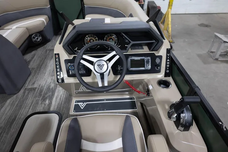 Slide: The Image of 2025 Viaggio X22S boat dashboard with steering wheel and control panel. - 6