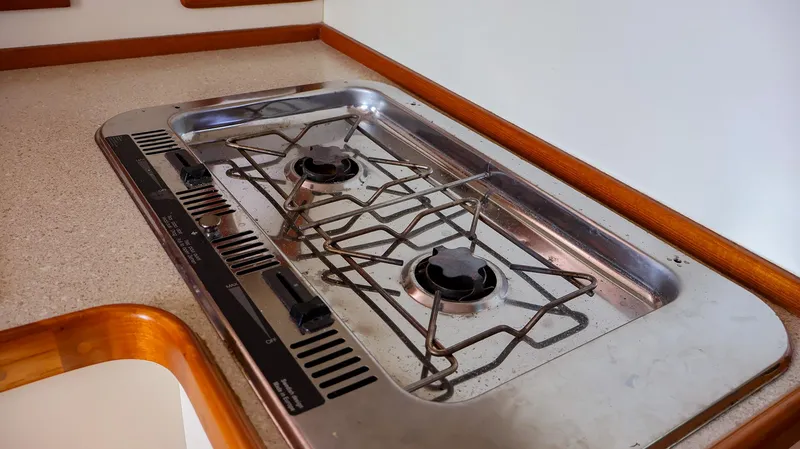 Slide: The Image of Two-burner stove on a 2008 Fortier 33 boat kitchen counter. - 24