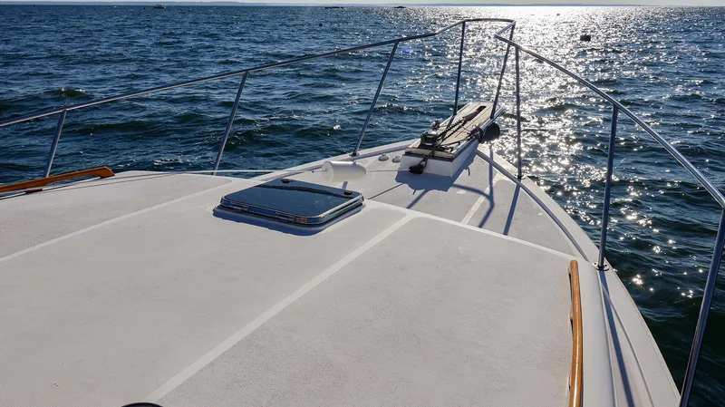 Slide: The Image of 2008 Fortier 33 boat deck on sunny ocean waters. - 4