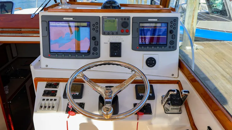 Slide: The Image of Fortier 33 boat helm with navigation screens and controls, 2008 model. - 6