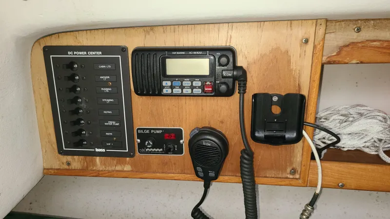 Slide: The Image of Control panel of a 2007 Alerion Express 28 sailboat with radio and power switches. - 20