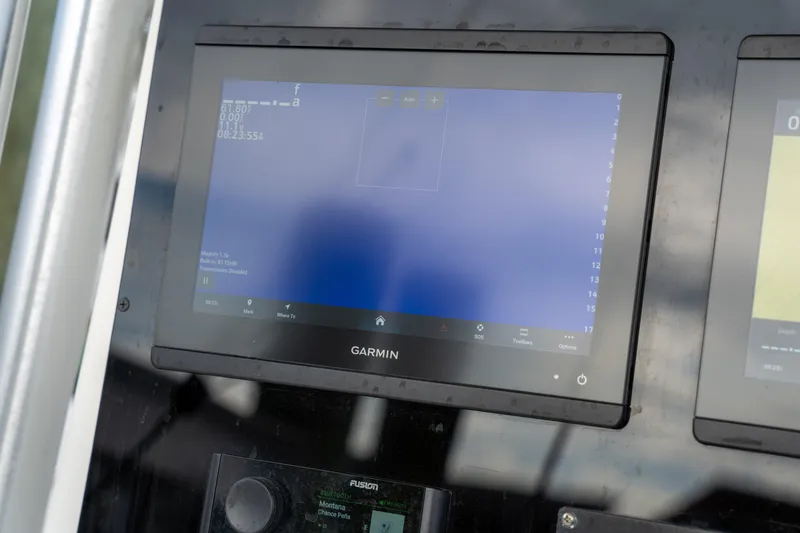 Slide: The Image of Garmin display on 2003 Regulator 32 Center Console boat dashboard. - 20