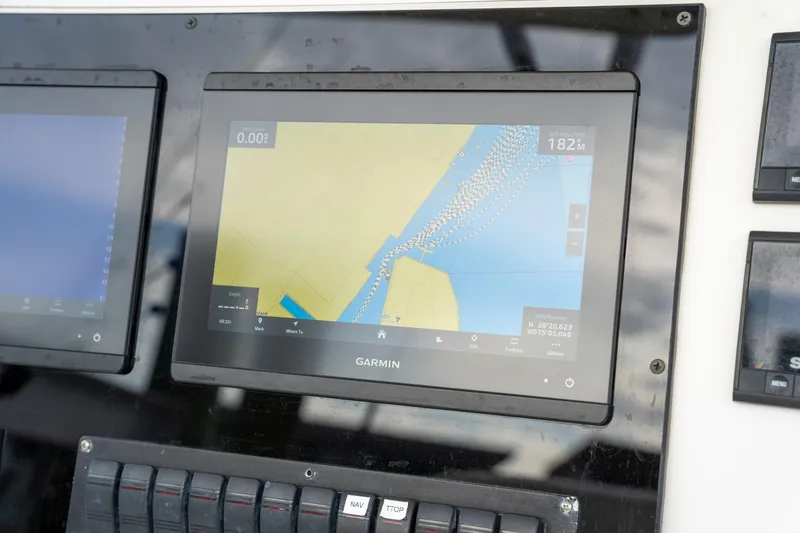 Slide: The Image of Garmin navigation display on 2003 Regulator 32 Center Console boat dashboard. - 21