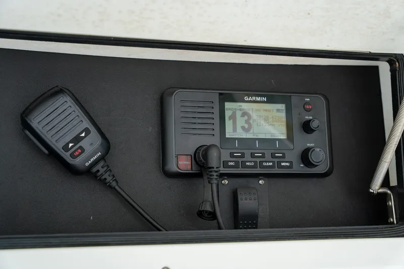 Slide: The Image of Garmin marine radio system in a 2003 Regulator 32 Center Console boat. - 23