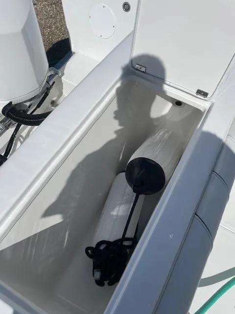 Slide: The Image of 2019 Buddy Davis CC boat storage compartment with equipment. - 7