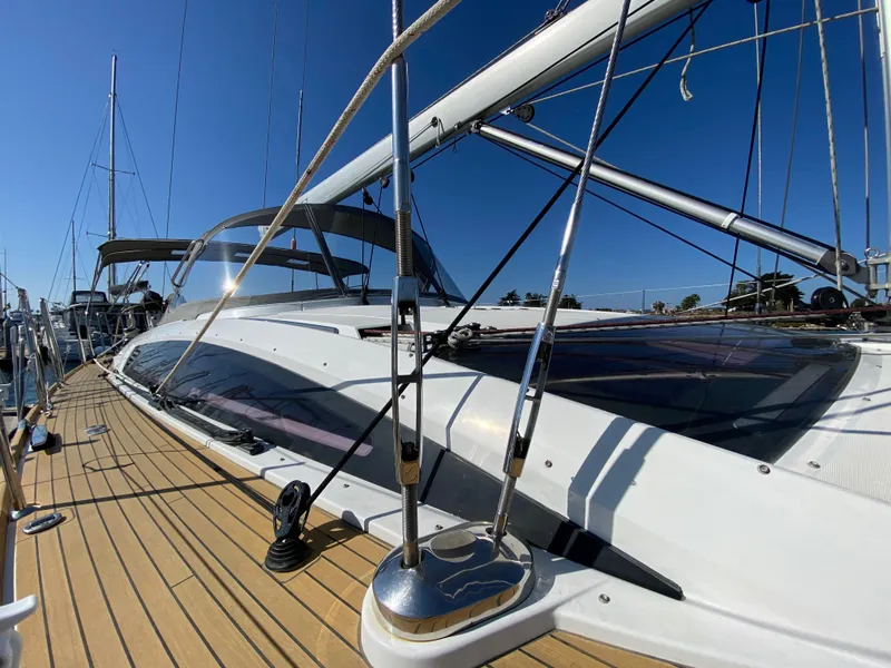 Slide: The Image of 2013 Jeanneau 57 sailboat with sleek deck design and modern rigging. - 14