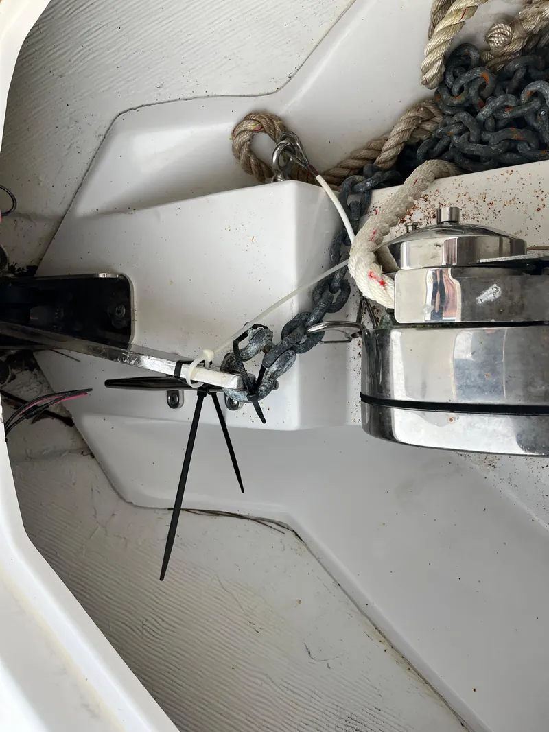 Slide: The Image of Anchor storage area of 2019 Sportsman Open 252 Center Console boat. - 13