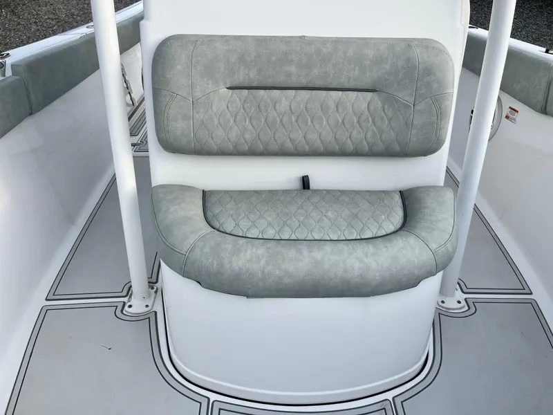 Slide: The Image of 2019 Sportsman Open 252 Center Console boat seat with gray upholstery. - 15