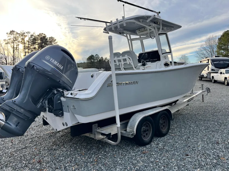Slide: The Image of 2019 Sportsman Open 252 Center Console boat on trailer with Yamaha engine. - 3