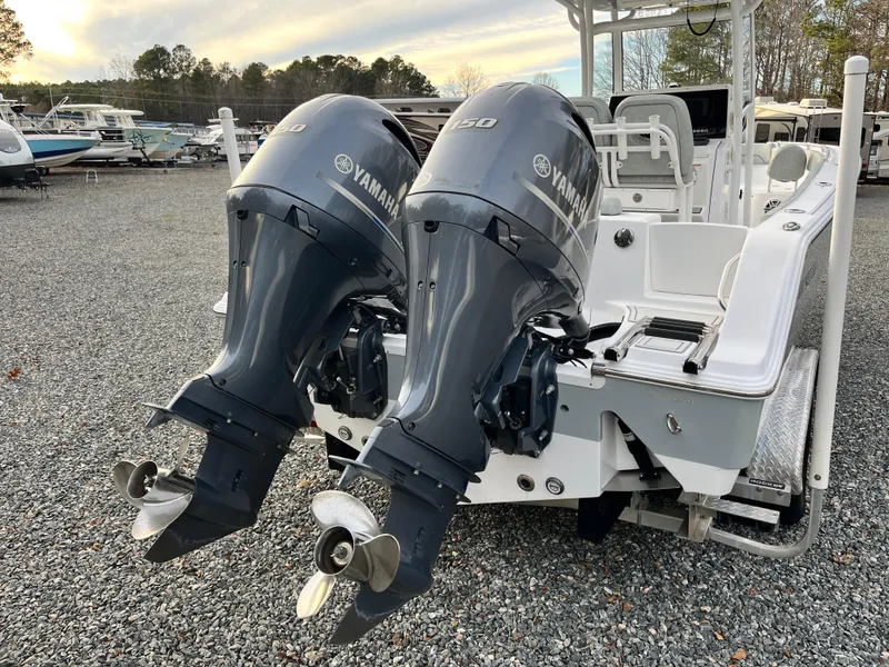 Slide: The Image of 2019 Sportsman Open 252 Center Console with twin Yamaha outboard engines. - 6