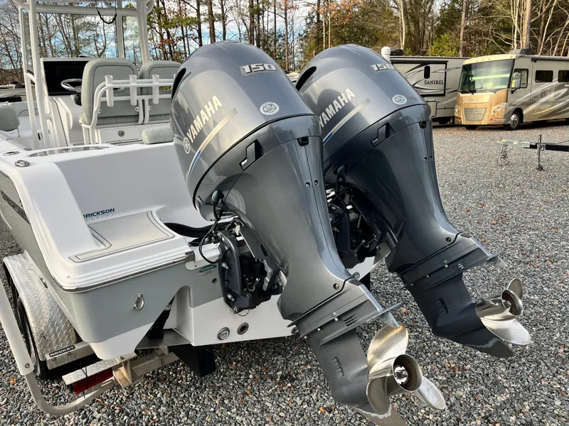 Slide: The Image of 2019 Sportsman Open 252 Center Console with twin Yamaha 150 outboard engines. - 7
