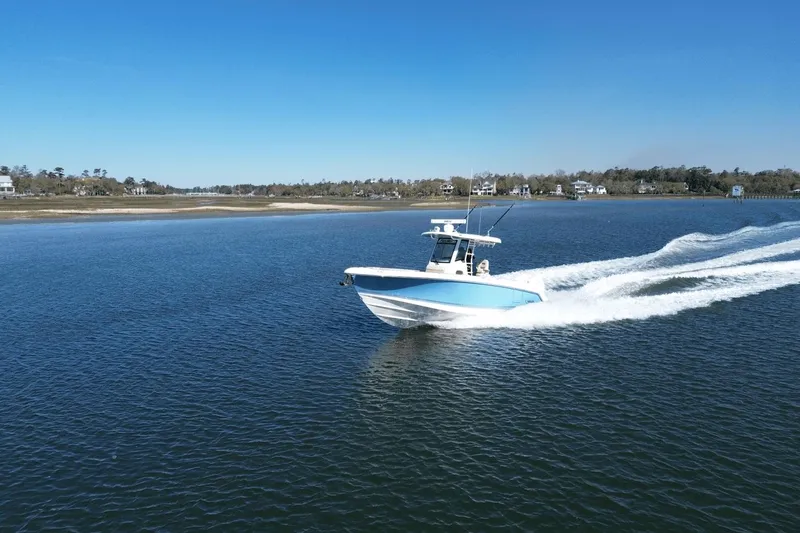 Slide: The Image of Boston Whaler 330 Outrage 2025 - 13