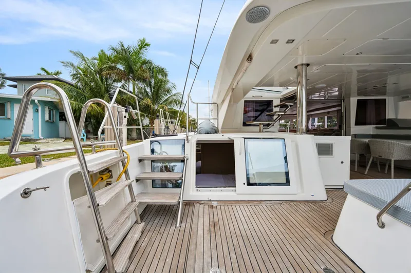 Slide: The Image of 2014 Lagoon 620 yacht deck with modern design and spacious layout. - 23