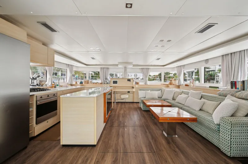 Slide: The Image of Luxurious interior of 2014 Lagoon 620 yacht with modern kitchen and spacious seating area. - 35