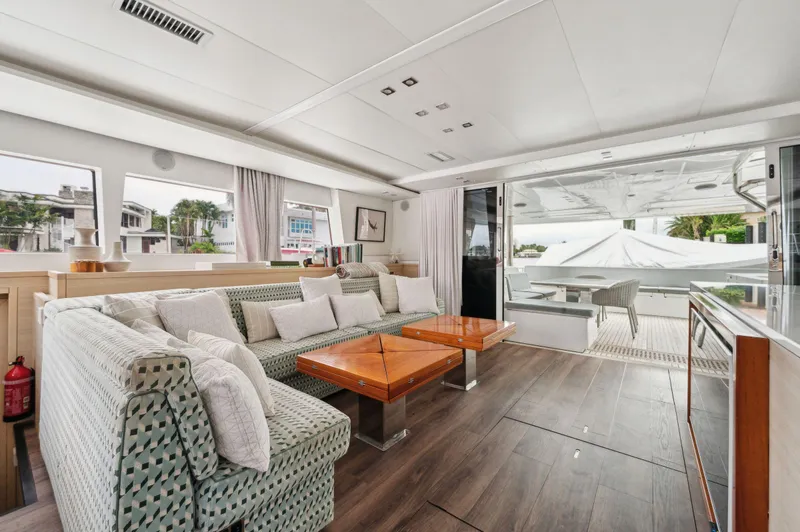 Slide: The Image of Luxurious interior of 2014 Lagoon 620 yacht with modern seating and wooden accents. - 38
