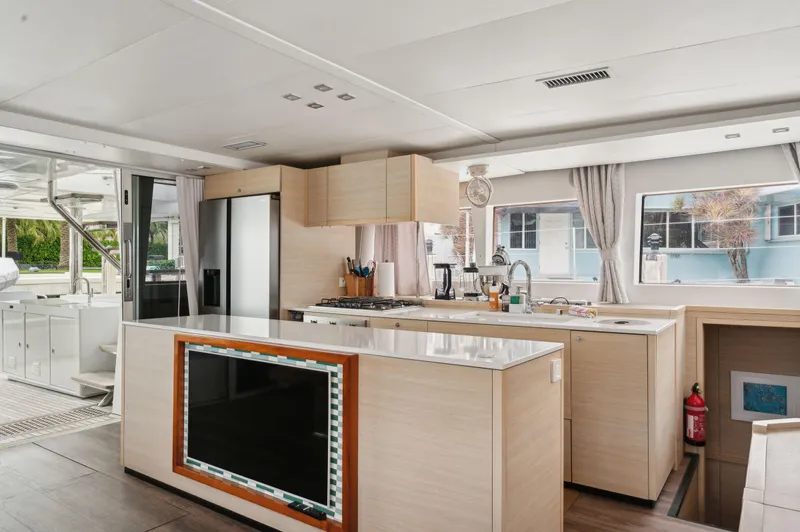 Slide: The Image of Luxurious interior of 2014 Lagoon 620 yacht with modern kitchen and spacious design. - 41