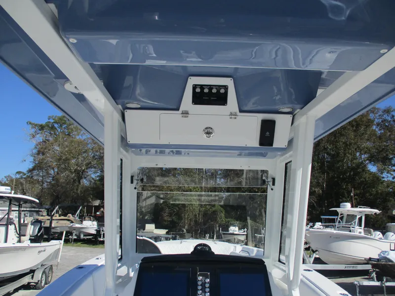 Slide: The Image of 2025 Sea Fox 268 Commander boat interior with control panel and navigation equipment. - 11