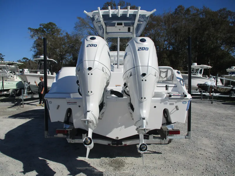 Slide: The Image of 2025 Sea Fox 268 Commander with twin 200 horsepower engines, rear view. - 2