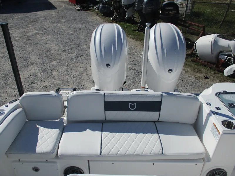 Slide: The Image of 2025 Sea Fox 268 Commander boat with dual engines and cushioned seating. - 7