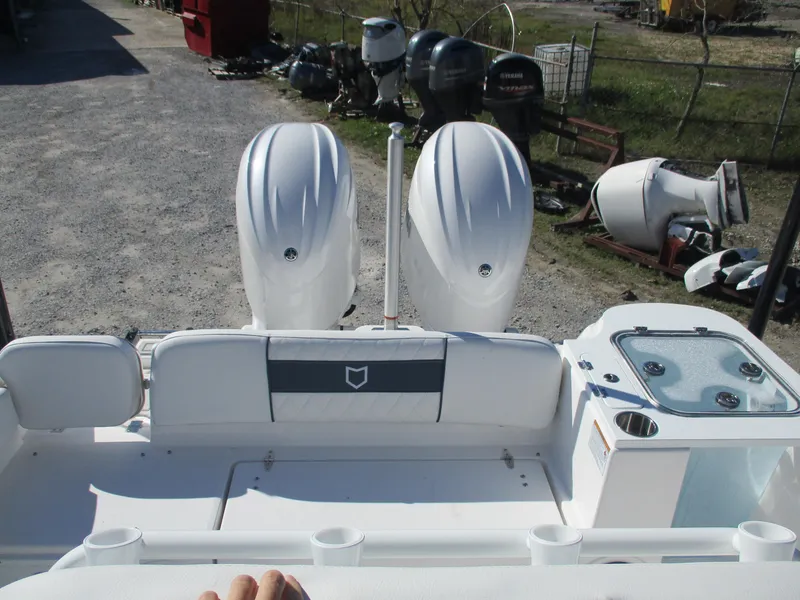 Slide: The Image of 2025 Sea Fox 268 Commander boat with dual outboard engines, rear view. - 8