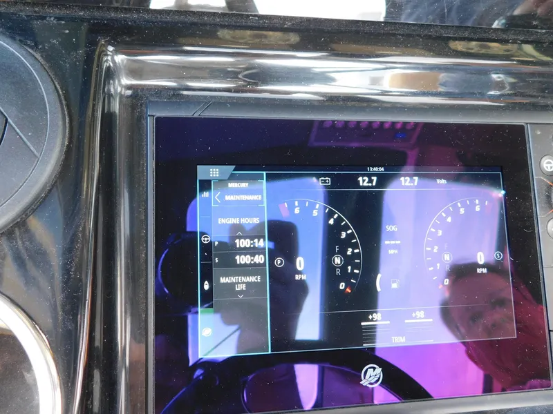 Slide: The Image of 2024 Scout 33LXF dashboard display showing engine metrics and maintenance information. - 27