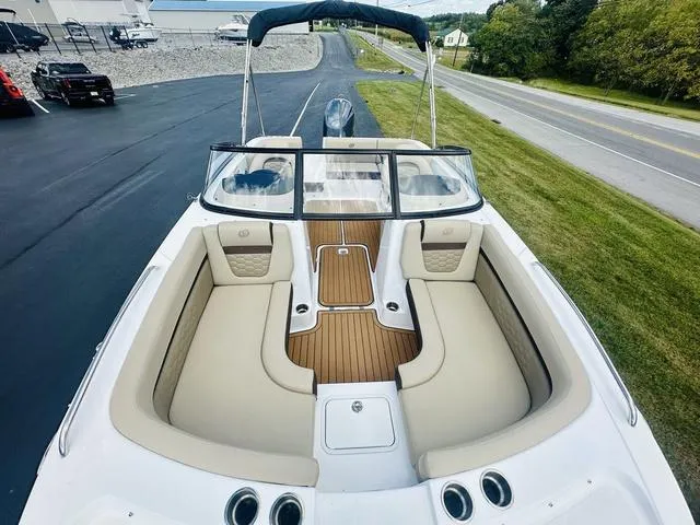 Slide: The Image of 2022 Hurricane SunDeck 191 OB boat with spacious seating and sleek design. - 5