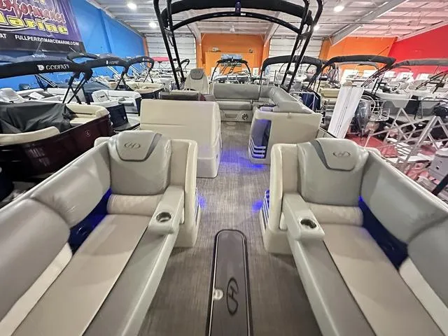 Slide: The Image of 2018 Harris Grand Mariner SEL 250 pontoon boat interior with luxurious seating and ambient lighting. - 20