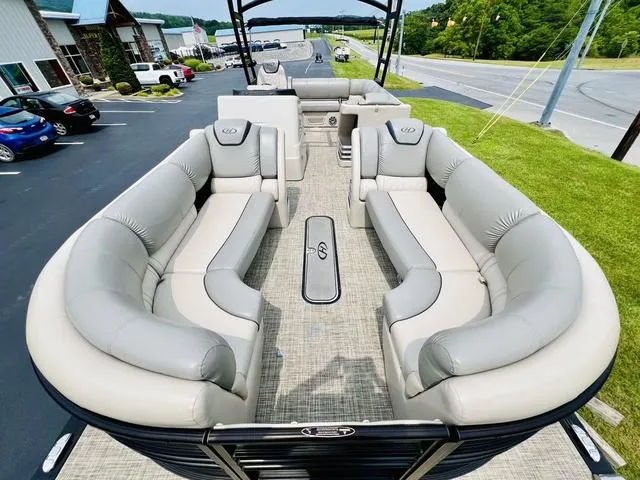 Slide: The Image of 2018 Harris Grand Mariner SEL 250 pontoon boat with spacious seating and modern design. - 6