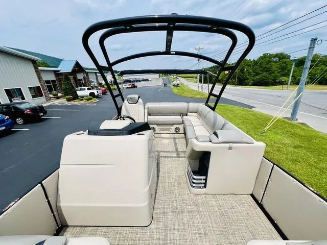 Slide: The Image of 2018 Harris Grand Mariner SEL 250 pontoon boat with spacious seating and sleek design. - 7