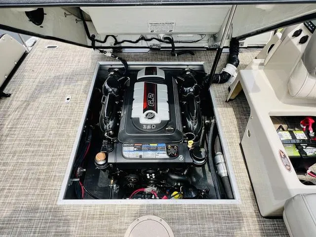 Slide: The Image of 2018 Harris Grand Mariner SEL 250 engine compartment with 6.2L engine. - 8
