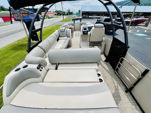 Slide: The Image of 2018 Harris Grand Mariner SEL 250 pontoon boat with spacious seating and modern design. - 9