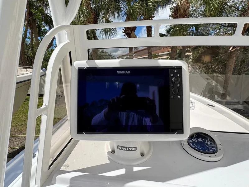 Slide: The Image of Simrad display on 1986 Mako 224 CC boat dashboard with NavPod mount. - 13