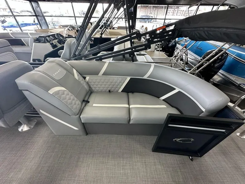 Slide: The Image of Luxurious seating on 2025 Crest Classic 220 SLC 3 Toon pontoon boat, featuring modern design. - 12