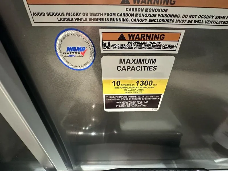 Slide: The Image of Warning label on 2025 Avalon 2185 Venture CR, indicating maximum capacity and safety instructions. - 8