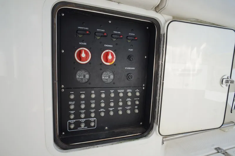 Slide: The Image of Control panel on a 2017 Boston Whaler 330 Outrage boat. - 15