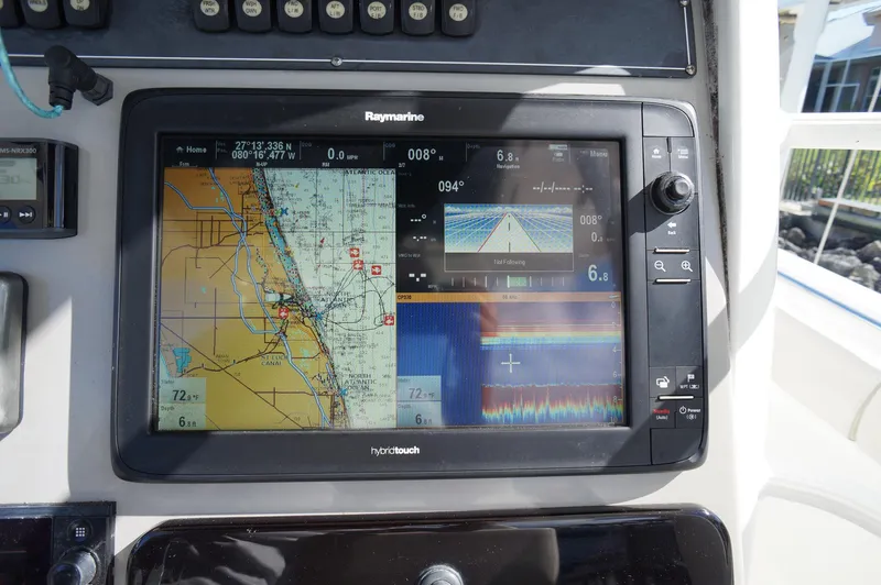 Slide: The Image of Raymarine navigation display on 2017 Boston Whaler 330 Outrage boat dashboard. - 18