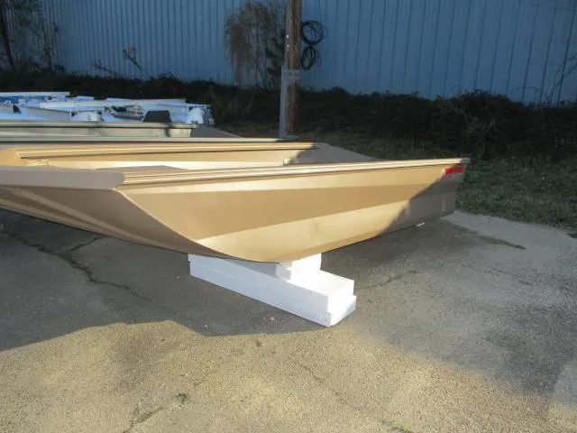 Slide: The Image of Reaper Boats 553-1239, 2025 model, displayed outdoors on a white block. - 1
