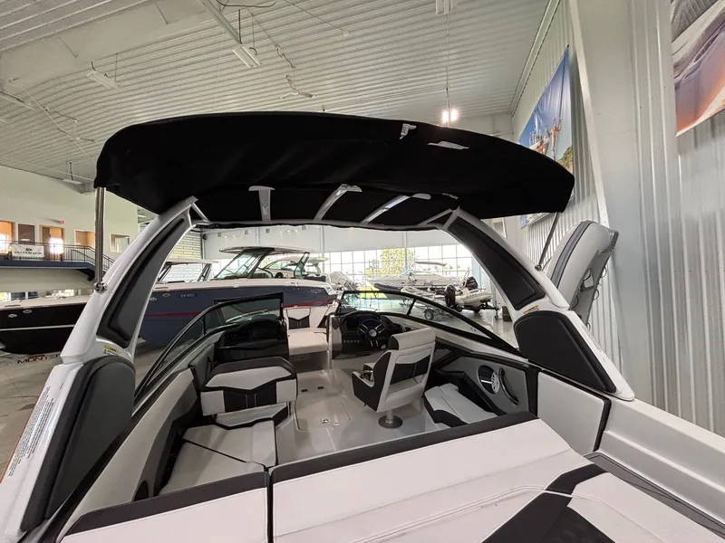 Slide: The Image of 2025 Monterey 238SS Luxury Bowrider in showroom. - 21
