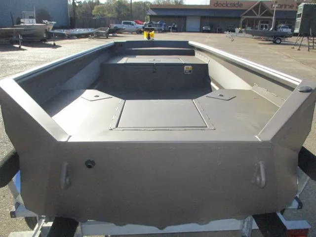 Slide: The Image of 2025 Reaper Boats 553-1238 model, dockside view, sleek design, gray finish. - 4