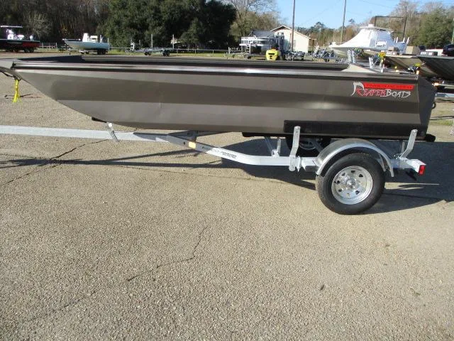 Slide: The Image of 2025 Reaper Boats 553-1238 on trailer, parked outdoors. - 5
