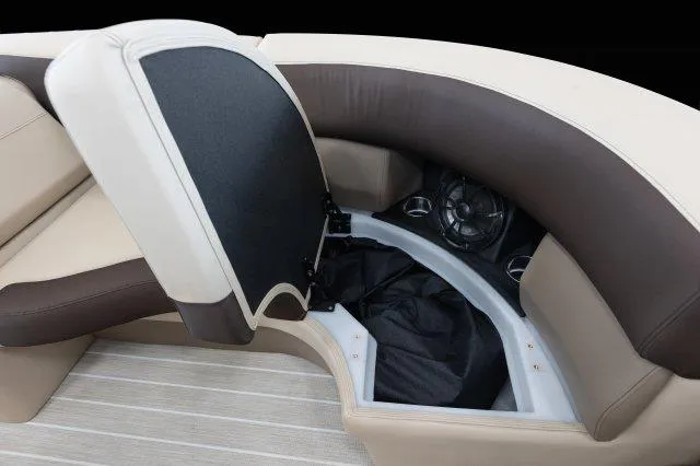 Slide: The Image of 2024 Berkshire 23ULSTS3-93 boat seating with storage compartment and speaker system. - 9