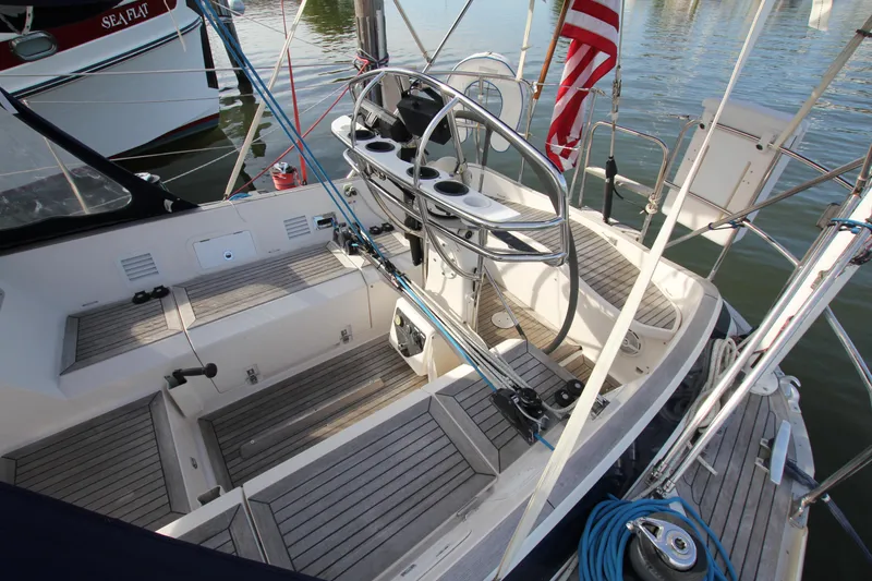 Slide: The Image of Cockpit of 2001 Nautor Swan 44MKII sailboat with steering wheel and seating. - 11