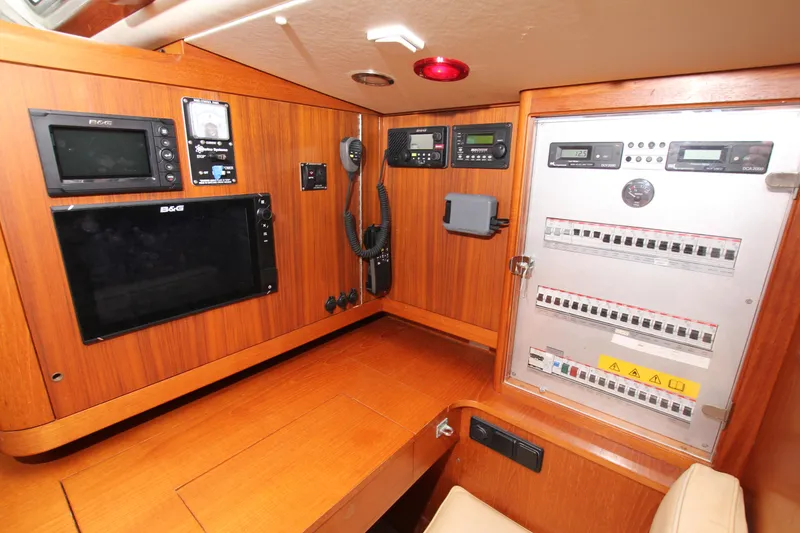 Slide: The Image of Navigation and control panel inside a 2001 Nautor Swan 44MKII yacht. - 38