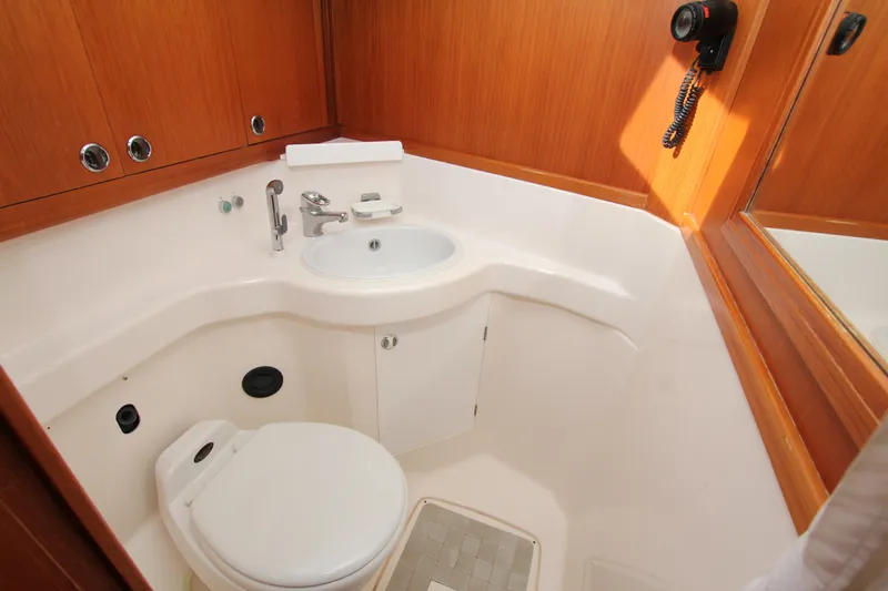 Slide: The Image of Bathroom interior of 2001 Nautor Swan 44MKII yacht with sink and toilet. - 39