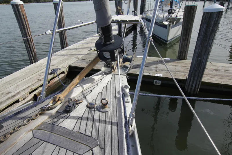 Slide: The Image of Sailboat docked at marina, Nautor Swan 44MKII, 2001 model, wooden deck details. - 4